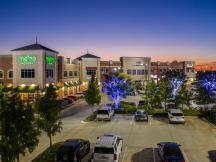 Shoppes at Quail Springs retail space for lease Oklahoma City, OK exterior night  photo